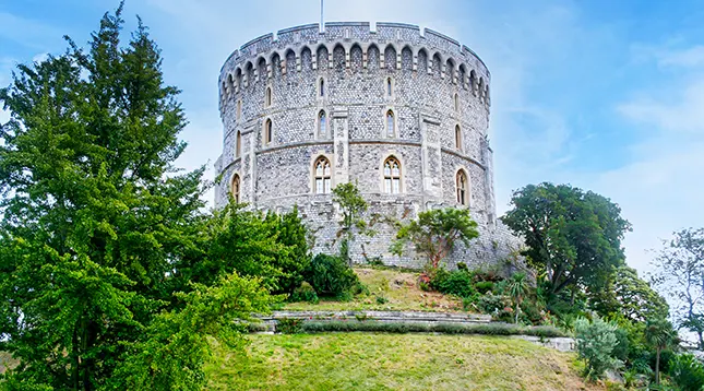 The curved, 15th-century Horseshoe Cloisters—restored in the 19th century and still home to the chapel’s clergy.